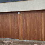 Hardwood Double sliding Garage Doors.